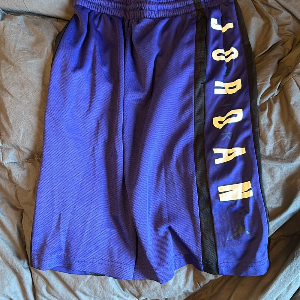 Purple air Jordan boys basketball shorts size Large.